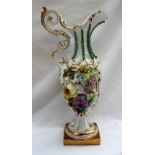 A 19th century continental porcelain ewer the neck with beaded bands,