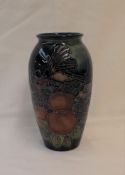 A Moorcroft pottery vase, decorated in the Finch pattern to a graded blue ground, impressed marks,