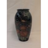 A Moorcroft pottery vase, decorated in the Finch pattern to a graded blue ground, impressed marks,