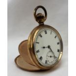 A gold plated keyless wound open faced pocket watch, with an enamel dial,