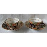 A pair of 19th century English porcelain tea cups and saucers,