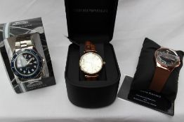 A Gentleman's Emporio Armani wristwatch with a silvered dial,