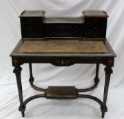 An Edwardian ebonised lady's writing desk, the raised superstructure with drawers,