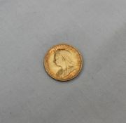 A Victorian gold half sovereign dated 1900