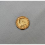 A Victorian gold half sovereign dated 1900