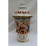 A Capodimonte vase and cover moulded with fruit,