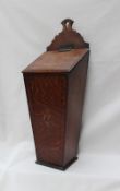 An 18th century oak candle box, of tapering form,