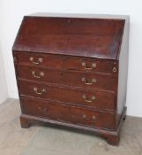 An 18th century oak bureau,