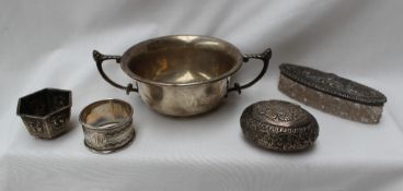 A George V silver twin handled bowl, Birmingham, 1938, together with a silver napkin ring,