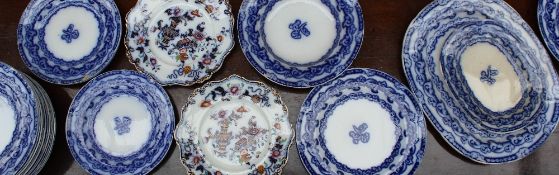 A 19th century flo blue part dinner service decorated in the Altona pattern,
