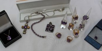 An amethyst and silver pendant together with assorted amethyst set jewellery including rings,