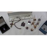 An amethyst and silver pendant together with assorted amethyst set jewellery including rings,