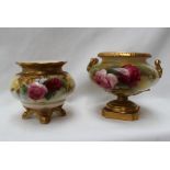 A Royal Worcester porcelain twin handled vase of squat form painted with roses and leaves to an