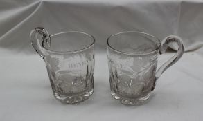 A pair of 19th century glass beer mugs engraved with wheat sheaf and leaves, "Henry Blisset",