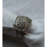 A diamond encrusted dress ring,