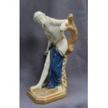 A Royal Worcester porcelain and Parian figure of a semi nude maiden,