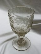 A 19th century oversized wine glass embellished with the rose and thistle initialled "FJP" with a