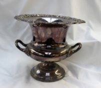 A silver on copper campana shaped twin handled silver on copper wine cooler with a vine and grape