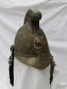 A Victorian white metal Merryweather pattern fireman's helmet, with dragon scroll crest and badge,