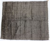A Persian goat hair rug, with striped decoration 190 x 127cm together with another goat hair rug,