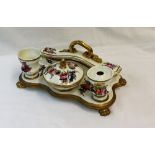 A 19th century Derby inkstand, painted with sprays of garden flowers,