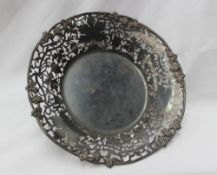 An Elizabeth II silver bon bon dish, of circular form, cast with grapes and leaves to a pierced rim,