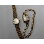 A lady's 9ct yellow gold wristwatch, the circular dial inscribed Garrard, on a 9ct gold strap,