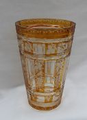 A 19th century continental amber flash glass vase of tapering cylindrical form decorated with