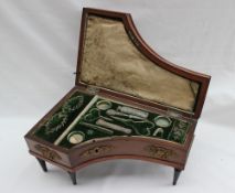 A 19th Century mahogany sewing box, in the form of a grand piano,