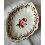 A Derby lobed pointed oval dish, painted with a continuous band of flowers to the rim,