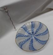 A 19th century glass plate with white and blue cotton twist decoration, 17cm diameter,
