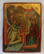 An Icon, painted onto a wooden panel, depicting an angel and a seated figure,