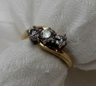 A three stone diamond line ring,