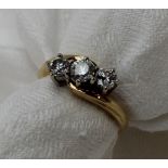 A three stone diamond line ring,