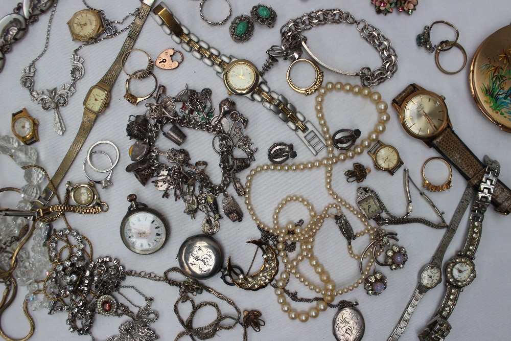 A silver charm bracelet, together with assorted costume jewellery including watches, rings,