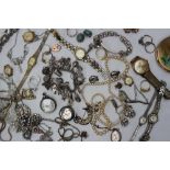 A silver charm bracelet, together with assorted costume jewellery including watches, rings,