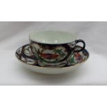 An 18th century Worcester porcelain tea cup and saucer,