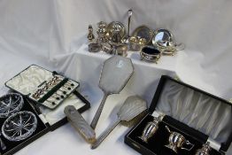 An Elizabeth II silver three piece cruet set, comprising an open table salt,