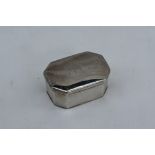 A late George III silver snuff box, of rectangular form with cut corners, initialled to the top,
