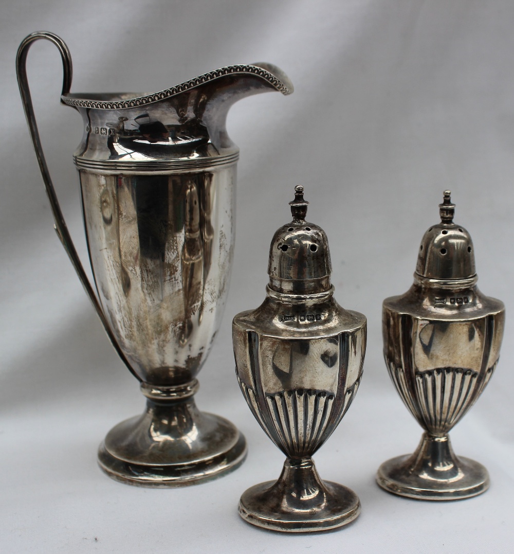 A George V silver sugar caster, of vase shape with a pierced top, Birmingham 1922, - Image 3 of 3