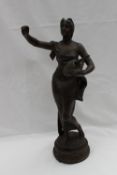 A Levasseur Muse De Bois A female figure holding a lyre Bronze Signed Bears a plaque "Muse Des