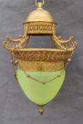 A Victorian green glass and gilt metal hanging light, with pierced decoration,