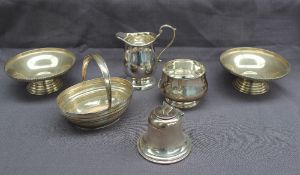 A pair of George VI silver pedestal bowls, Birmingham, 1940, together with a silver cream jug,
