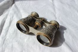 A pair of late Victorian silver opera glasses, chased with flower heads and leaves, Birmingham,