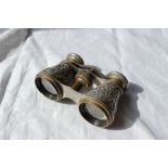 A pair of late Victorian silver opera glasses, chased with flower heads and leaves, Birmingham,