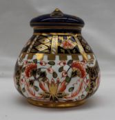 A Royal Crown Derby porcelain pot pourri vase and cover decorated in a version of the Imari pattern,