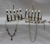 A pair of George VI silver toast racks, Sheffield, 1937,