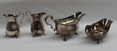 An Elizabeth II silver sauce boat, with a gadrooned rim on three shell capped legs, London, 1965,