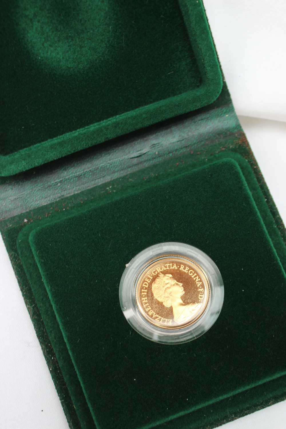 An Elizabeth II gold Proof Sovereign,