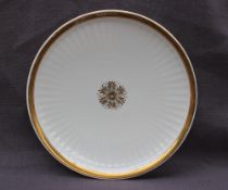 A Swansea porcelain Paris flute pattern plate, with a gilt rim,